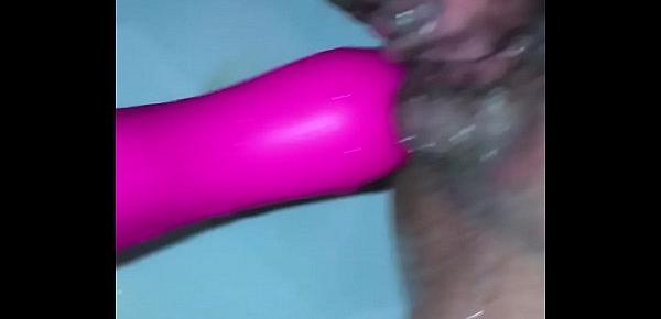  Amateur girl plays with her dildo til she squirts multiple times